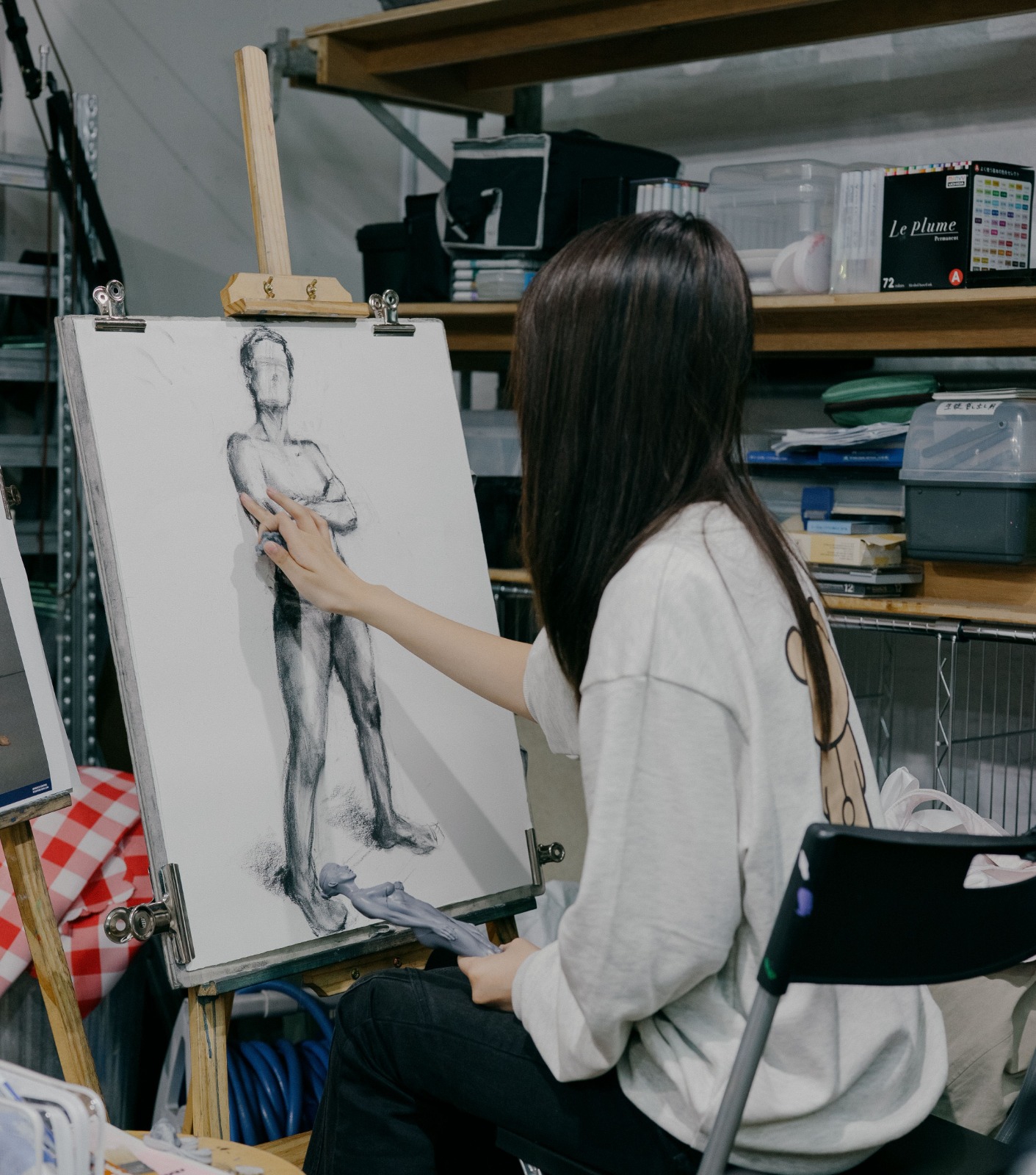 Student working on portraiture